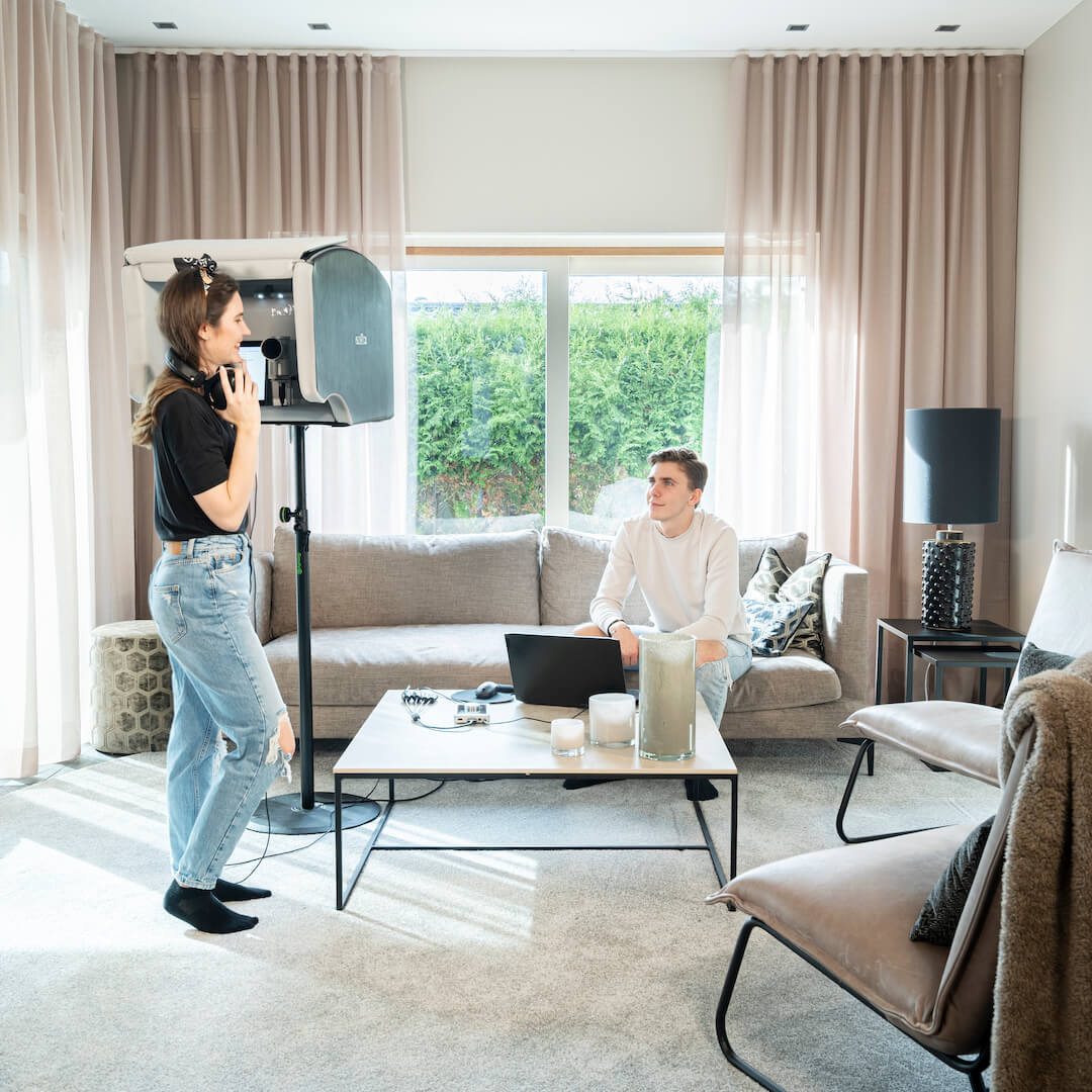 Person using a Portable Vocal Booth to record in home studio with the ISOVOX 2 Black