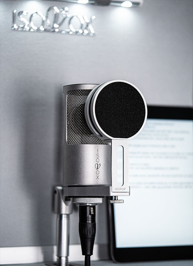 ISOMIC voice over microphone placed in the ISOVOX 2 Portable Vocal Booth